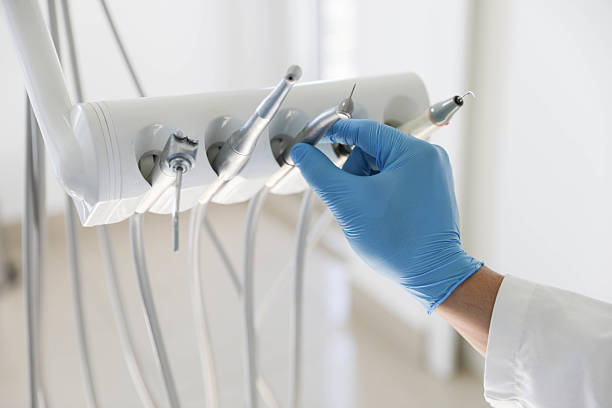 Professional Tooth Extraction technician working in Hart, MI
